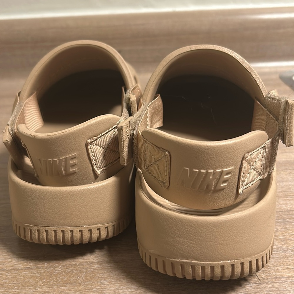 Nikes mules 
Women 10.5